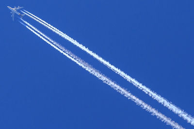 Low angle view of vapor trail in sky