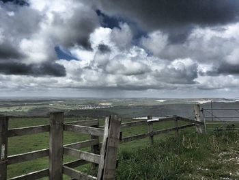 View of calm sea against cloudy sky