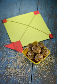 Sesame laddu in bowl, makar sankranti festival concept