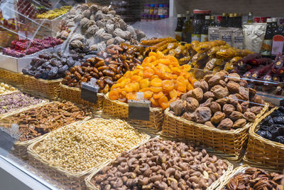Show-window with traditional georgian and turkish sweets. east candies, dried fruits, nuts