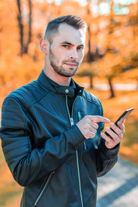 Young man using mobile phone