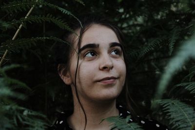 Portrait of young woman in the forest