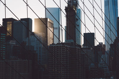 Low angle view of office building against sky in city