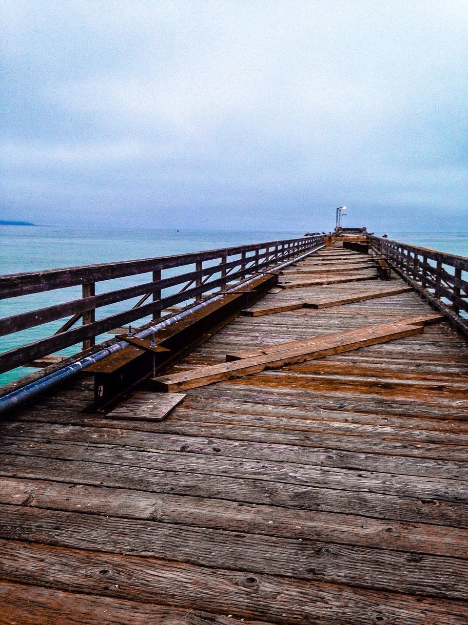 pier, water, sea, railing, wood - material, sky, tranquility, boardwalk, tranquil scene, jetty, scenics, nature, the way forward, built structure, horizon over water, beauty in nature, footbridge, wood, wooden, idyllic