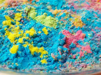 Full frame shot of powdered paint in container