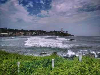 Scenic view of beach and sea against sky