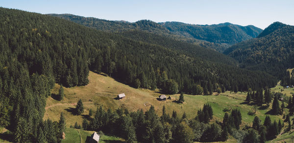 Scenic view of landscape and mountains against sky