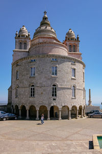 Low angle view of building against blue sky