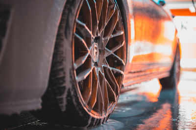 Close-up of tire in water