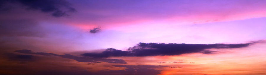 Low angle view of dramatic sky during sunset