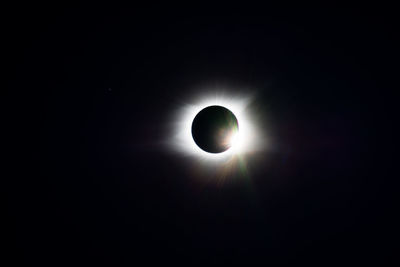 Low angle view of silhouette moon against sky