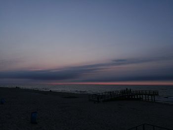 Scenic view of calm sea at dusk