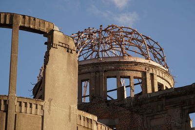 Low angle view of old building against sky