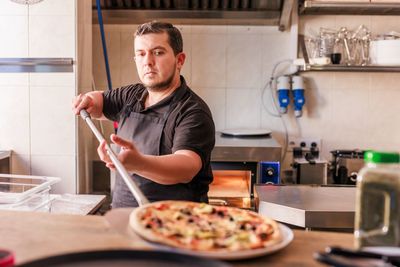 Man preparing food in kitchen