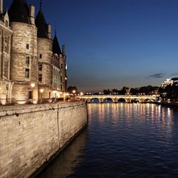 Reflection of illuminated buildings in water