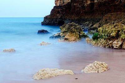 Scenic view of sea against clear sky