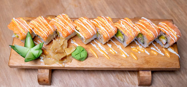 High angle view of sushi on cutting board