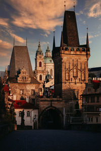 View of buildings against sky at sunset