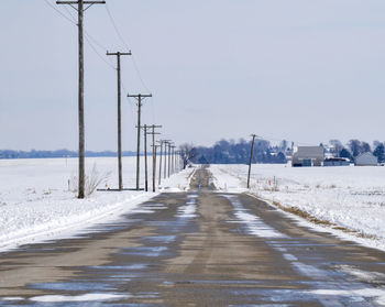 Empty road against clear sky