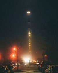 Illuminated street light at night