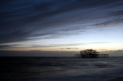 Scenic view of sea against sky at sunset