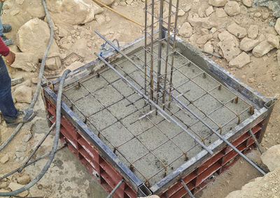 High angle view of old construction site on field