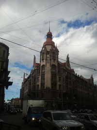 Low angle view of city street against sky