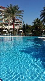 Swimming pool with buildings in background