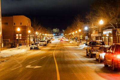 Traffic on city street at night