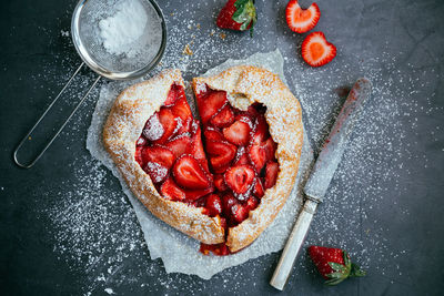 Directly above shot of strawberry tart on table