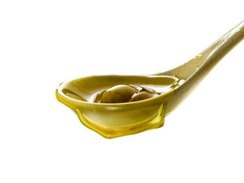 Close-up of drink against white background