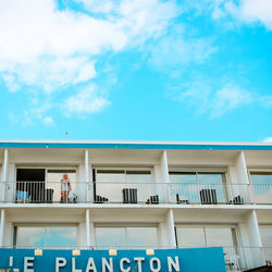 Low angle view of building against blue sky