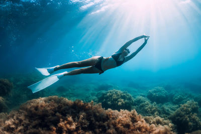 Man swimming in sea