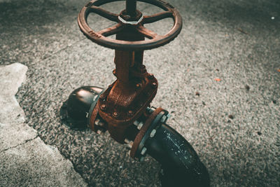 High angle view of rusty chain on street