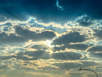 Low angle view of cloudy sky during sunset