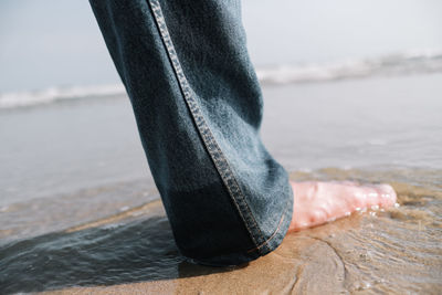 Low section of person on beach