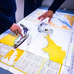 Close-up of hand holding paper
