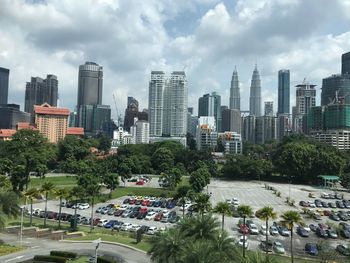 Modern buildings in city against sky