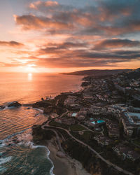 High angle view of sea against sky during sunset