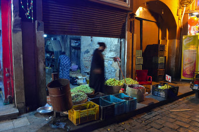 Man standing at market stall