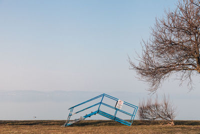 Built structure on field against clear sky