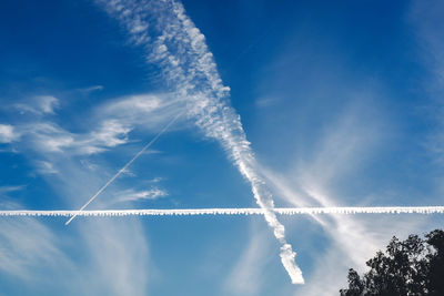 Low angle view of vapor trail in sky