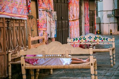 Empty chairs and tables in building