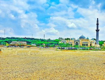 Built structure against cloudy sky