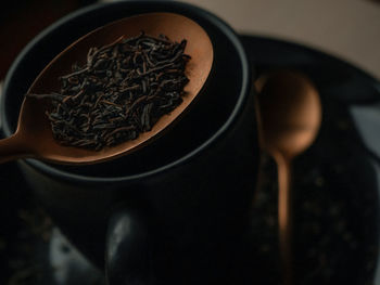 High angle view of coffee beans in bowl