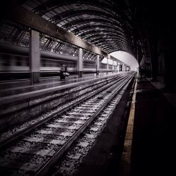 Railroad tracks on railroad station platform