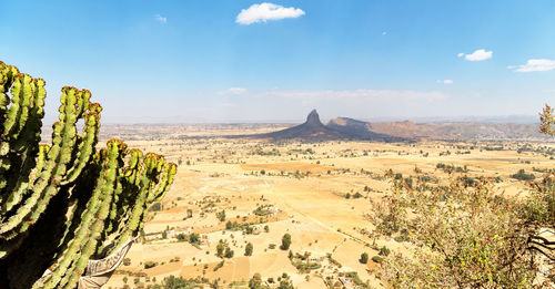 Panoramic view of desert against sky