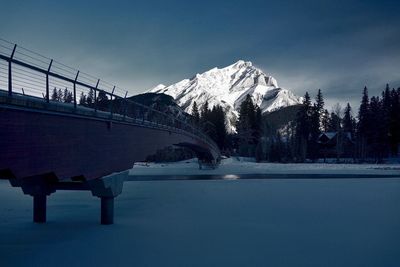 Scenic view of frozen lake against sky