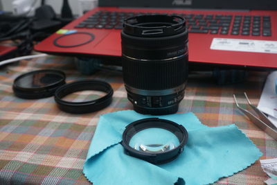 High angle view of camera on table