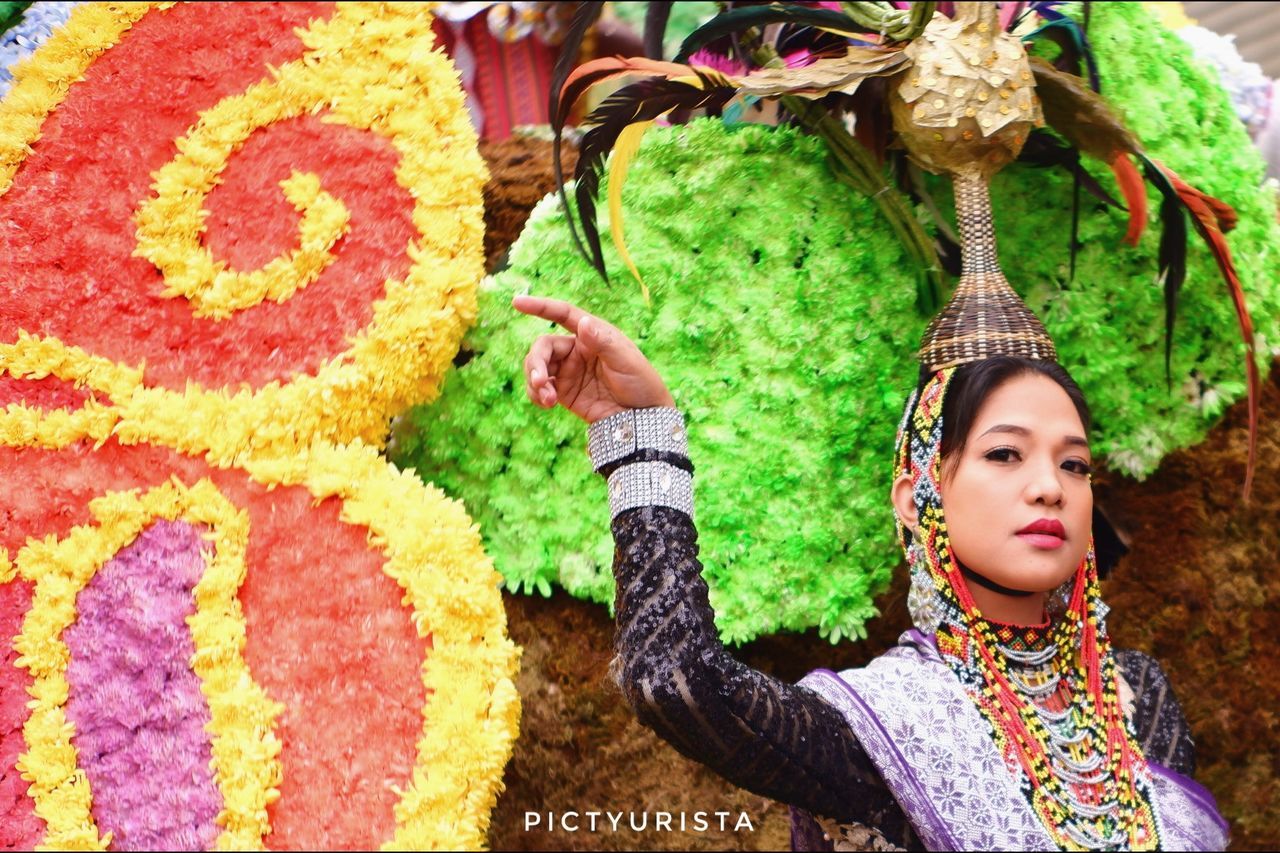 one person, women, real people, multi colored, childhood, child, portrait, females, girls, front view, lifestyles, clothing, traditional clothing, innocence, waist up, leisure activity, cute, day, human arm